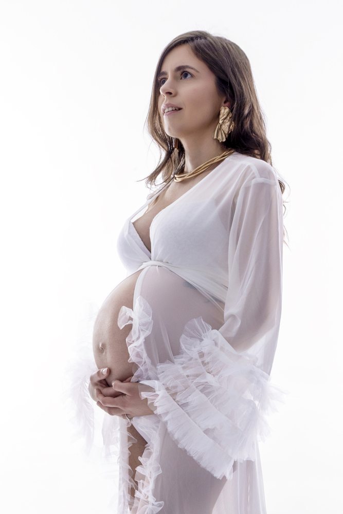 Fine art motherhood portrait in natural light